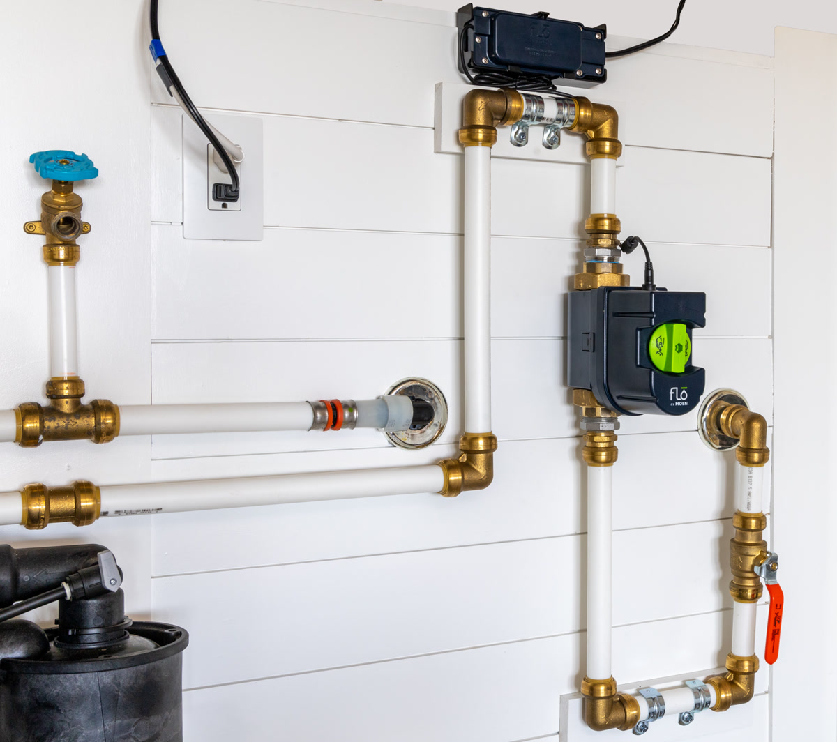 Moen Flo smart water monitor and shutoff valve installed on home plumbing