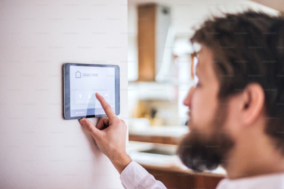 Smart home energy management dashboard on tablet showing power usage