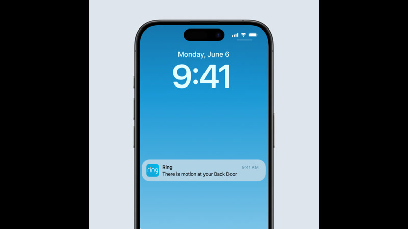 Smartphone displaying live video doorbell camera feed with motion alert notification for front door security
