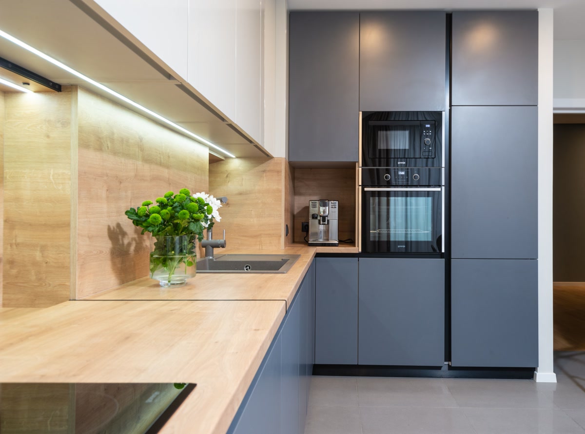 Modern kitchen with smart appliances on countertop