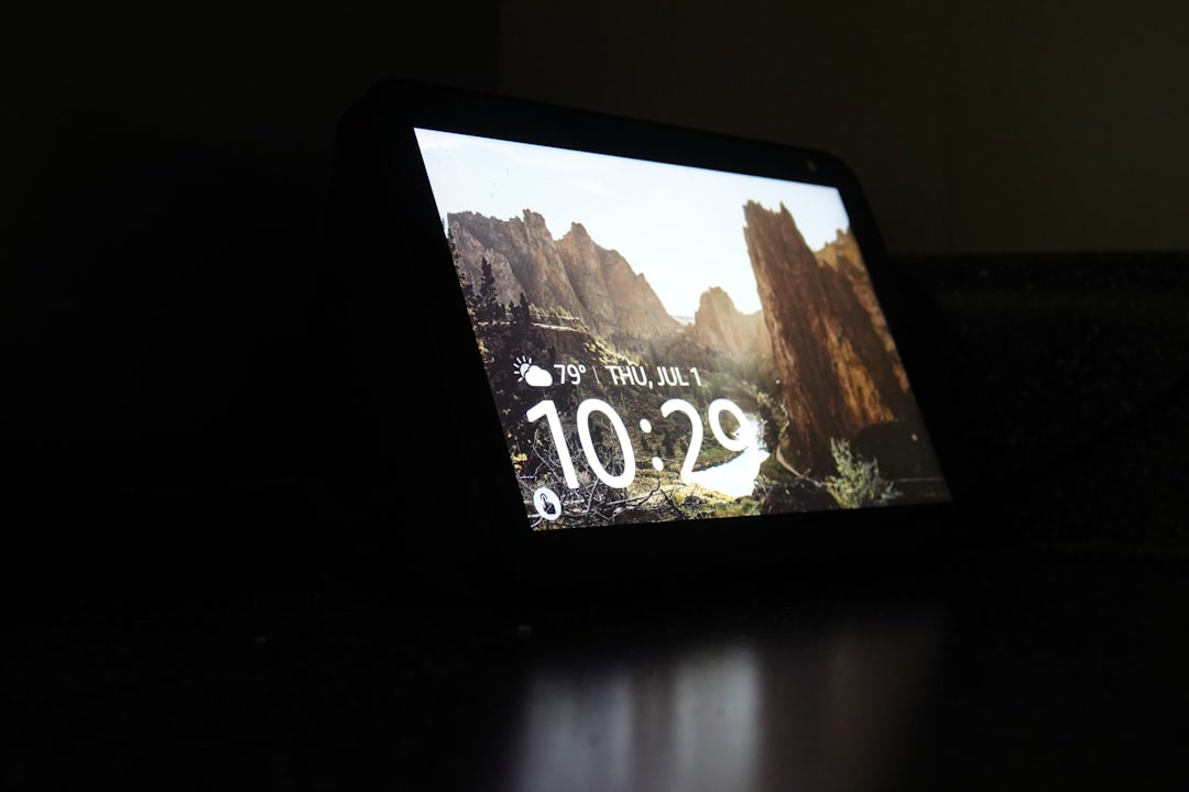 Smart display with touchscreen showing home device controls and dashboard