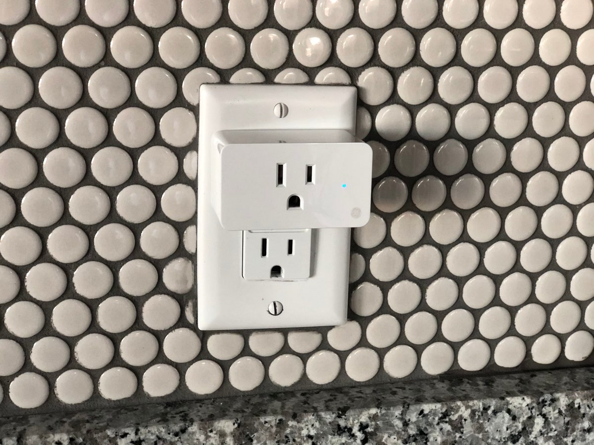 Kasa smart plug with energy monitoring on household appliance