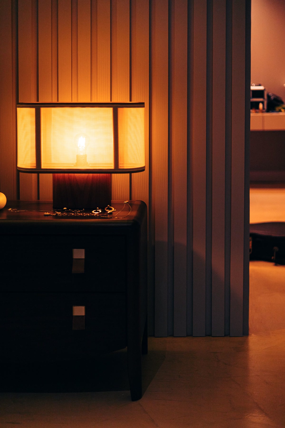 Warm bedside lamp with dimmed lighting for evening smart home routine