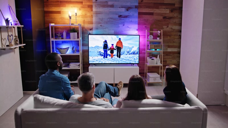 Living room movie night with dimmed smart lights
