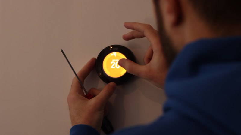 Smart thermostat installation on wall