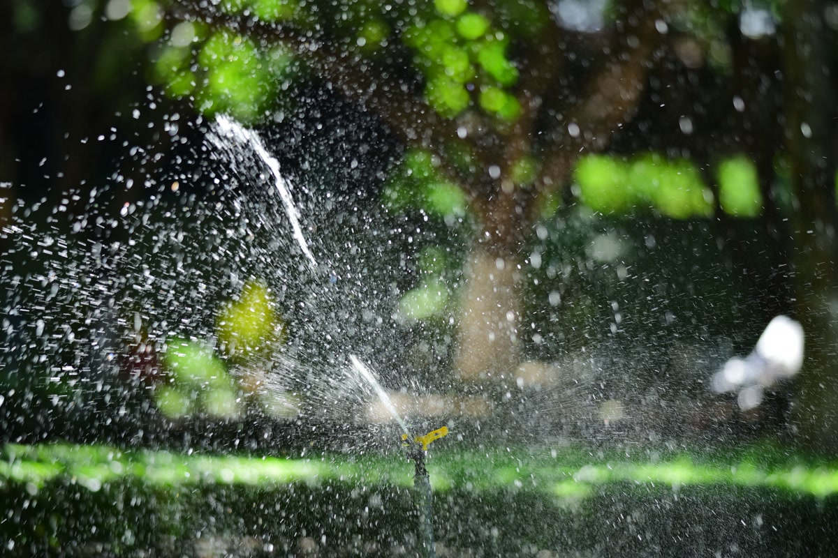 Smart irrigation system watering lawn and garden