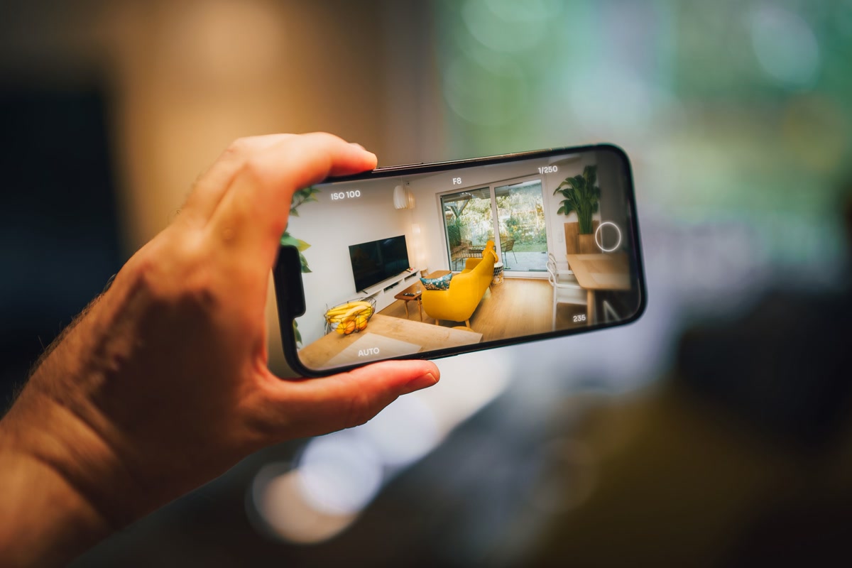 Smartphone showing video doorbell camera feed