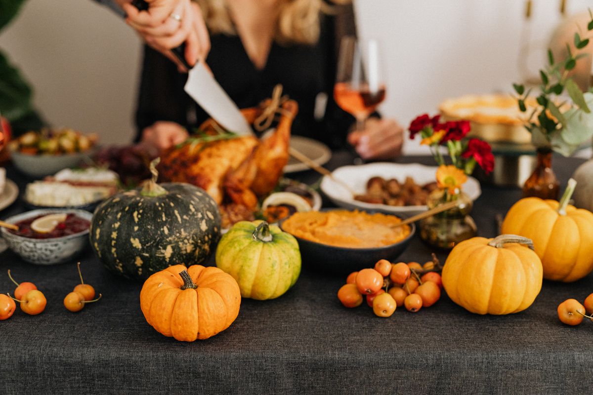 Woman preparing Thanksgiving dinner in a kitchen