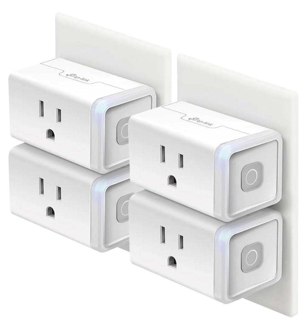 Four Kasa smart plug minis plugged into wall outlets